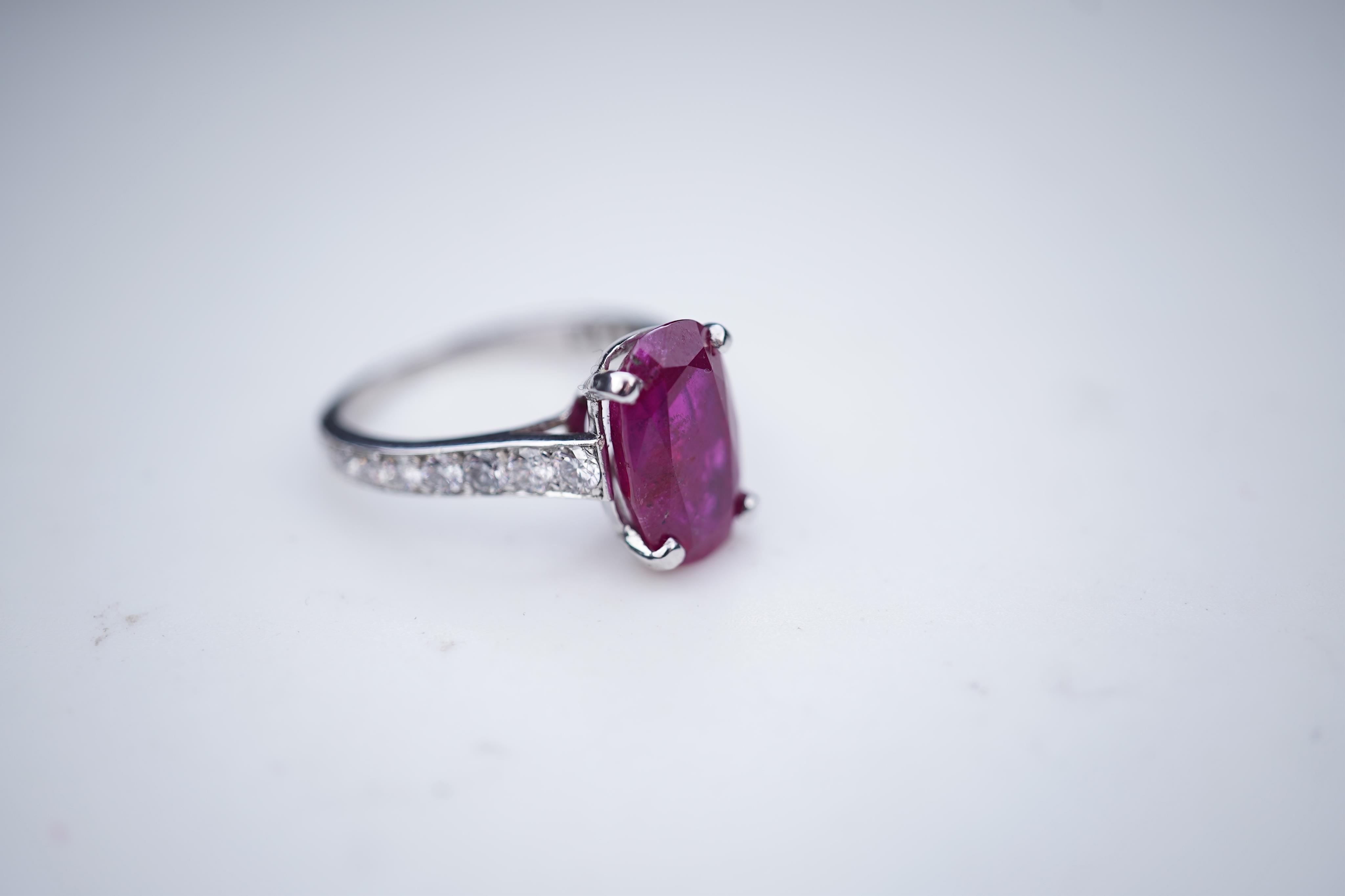 An attractive unheated ruby and diamond ring